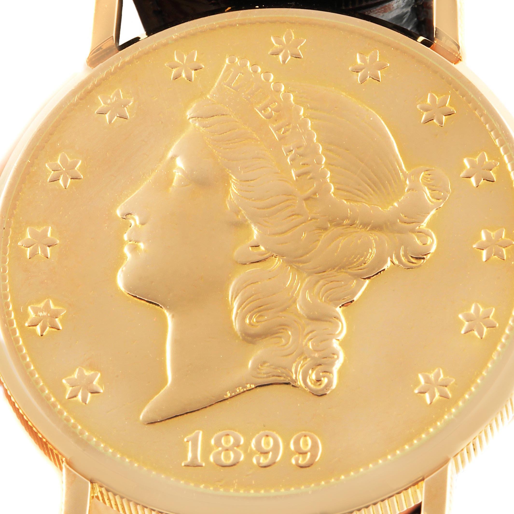 This close-up shot shows the dial of the Corum Coin Watch  Men's Yellow Gold Black Dial  Men's Yellow Gold Black Dial model featuring the 1899 coin design.