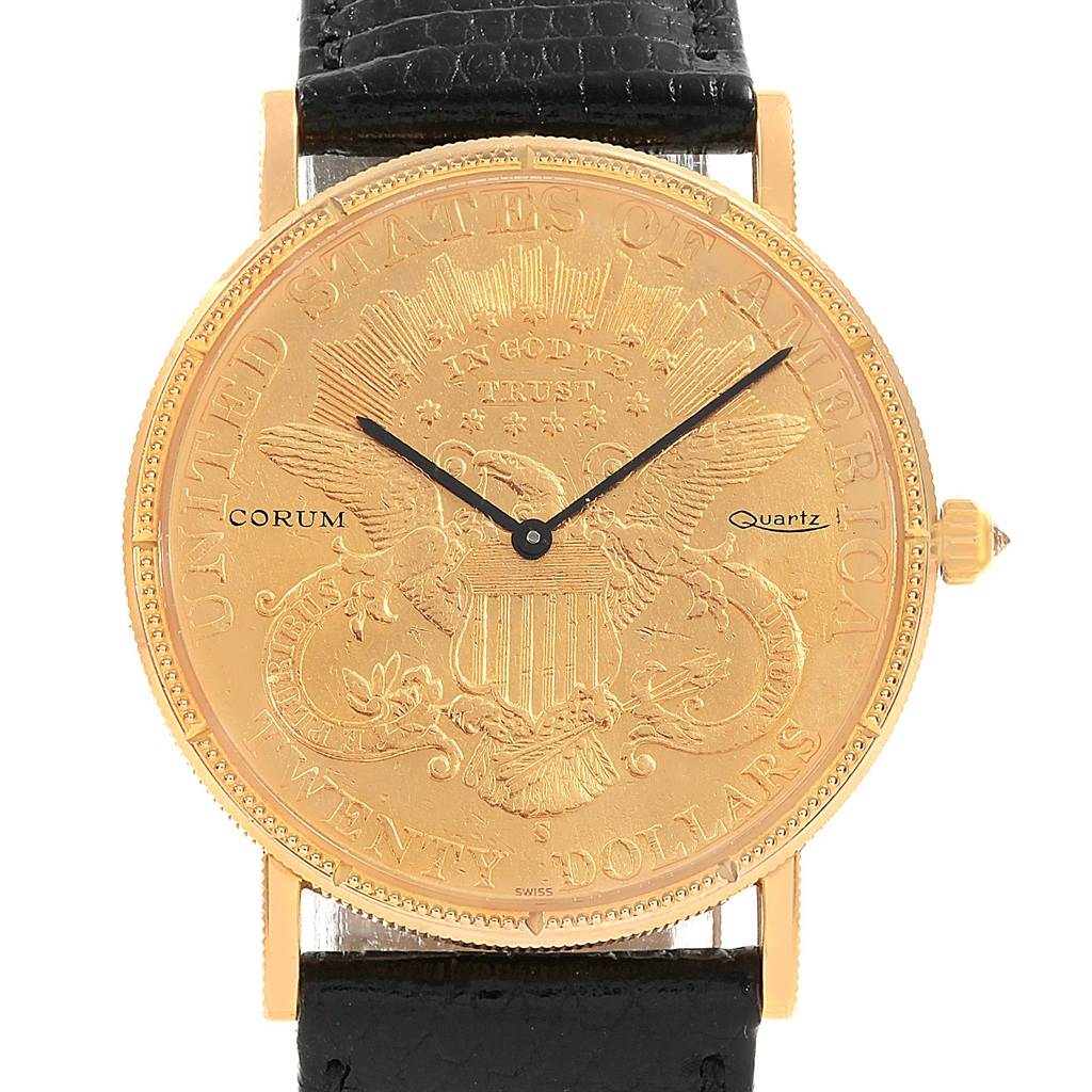 The watch displays a frontal view of the Corum Yellow Gold Black Dial Yellow Gold Black Dial 20 Dollars Double Eagle Yellow Gold Coin Year 1880 Watch, showcasing its dial and black leather strap.