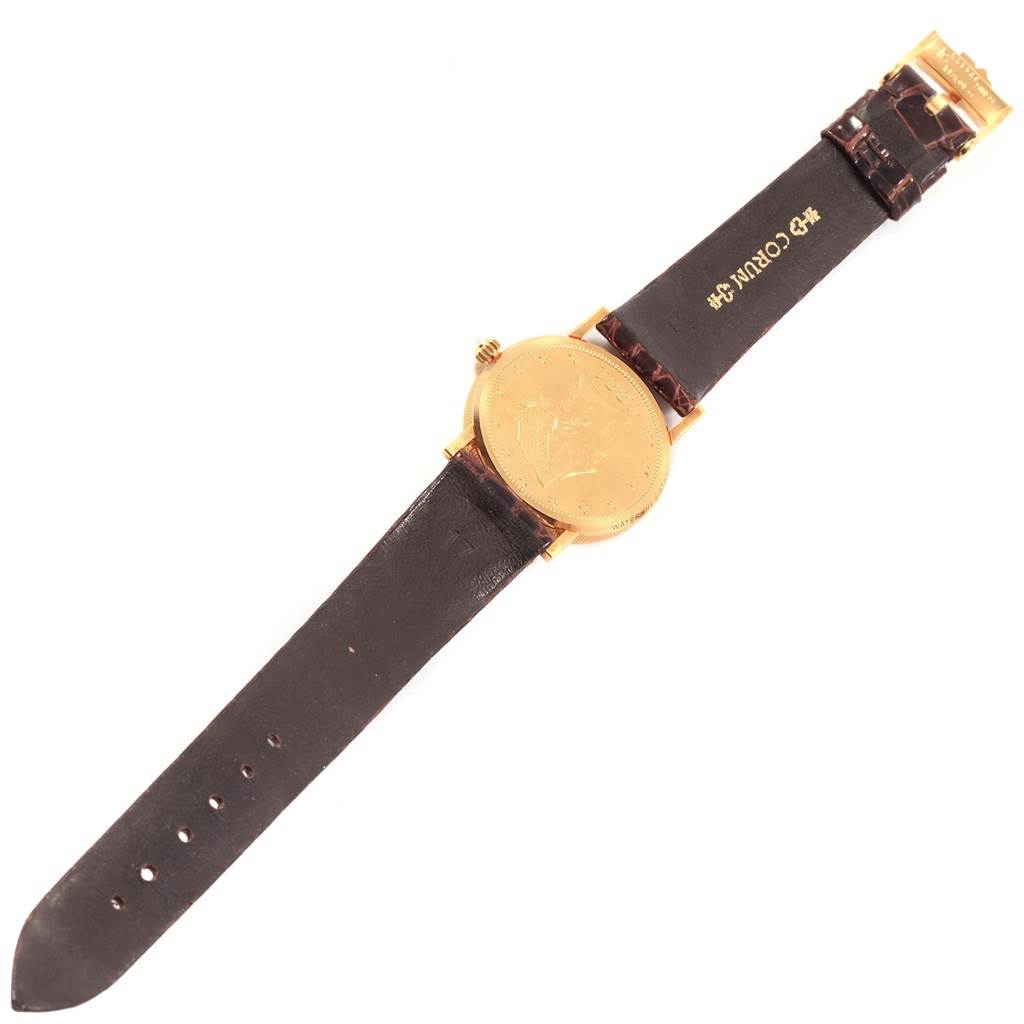 This image shows the front view of the Corum  Women's Yellow Gold Black Dial  Women's Yellow Gold Black Dial Yellow Gold 10 Dollars Coin Diamond Ladies Watch Year 1881 with a full strap extended.