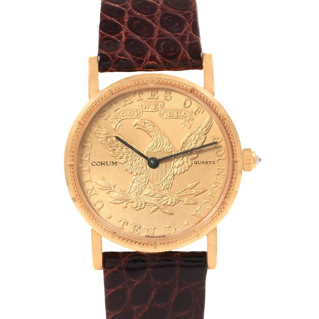 The image shows the front view of the Corum  Women's Yellow Gold Black Dial  Women's Yellow Gold Black Dial Yellow Gold 10 Dollars Coin Diamond Ladies Watch Year 1881 model with a detailed dial and brown strap.