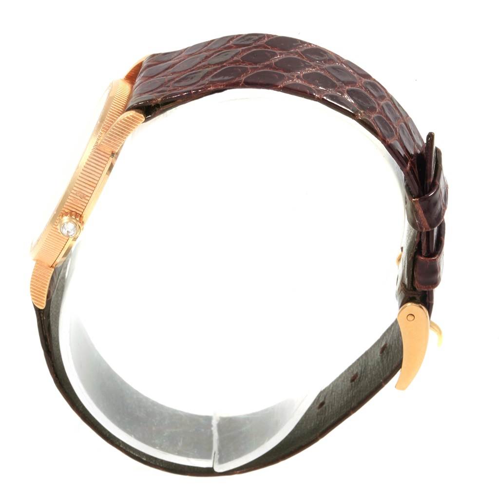 The image shows a side view of the Corum  Women's Yellow Gold Black Dial  Women's Yellow Gold Black Dial Yellow Gold 10 Dollars Coin Diamond Ladies Watch Year 1881, focusing on the bezel and band.