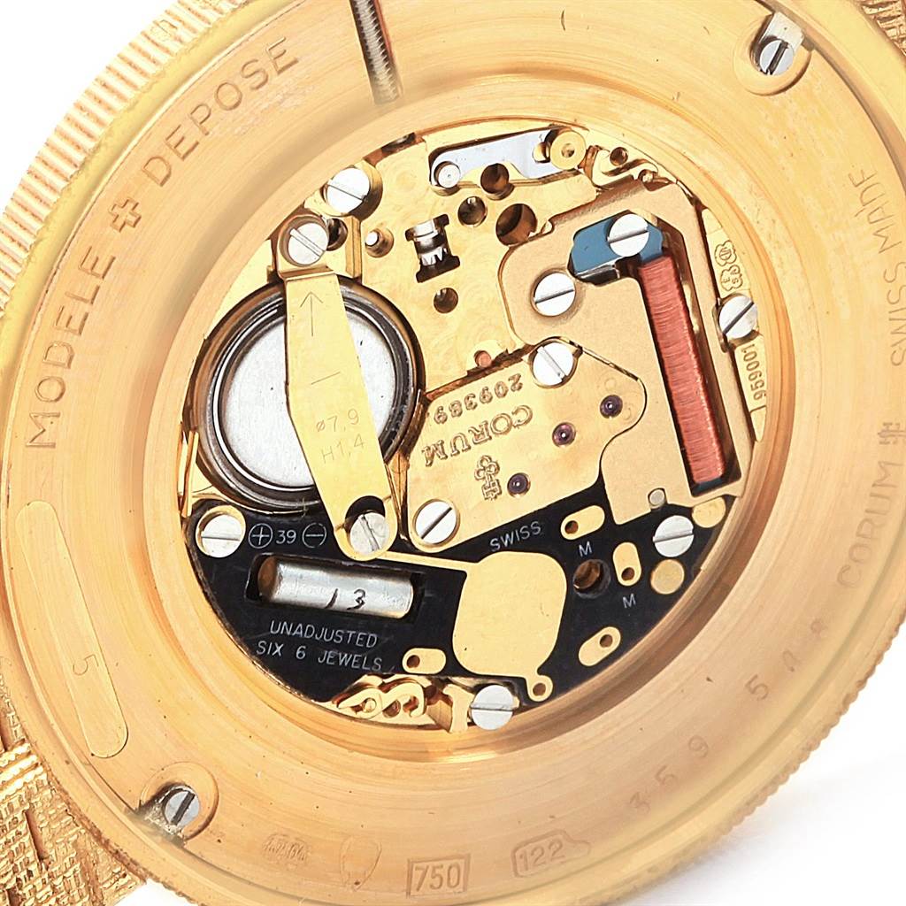 The image shows a close-up of the movement and inner components of a Corum Coin Watch Men's Yellow Gold Black Dial Men's Yellow Gold Black Dial model.