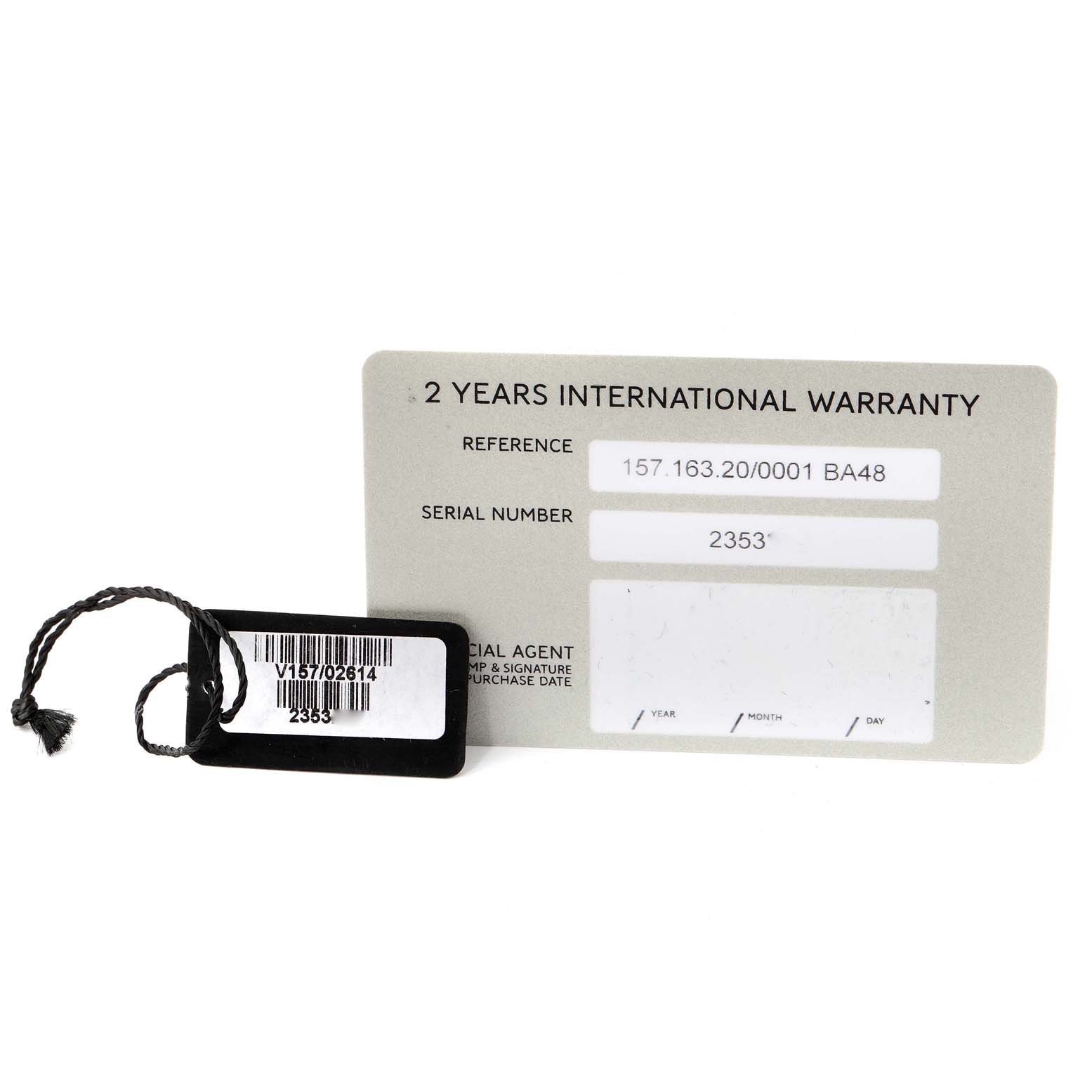 The image shows the international warranty card and hang tag for the Corum Heritage V157/02614 Men's Stainless Steel Silver Dial V157/02614 Men's Stainless Steel Silver Dial model watch.
