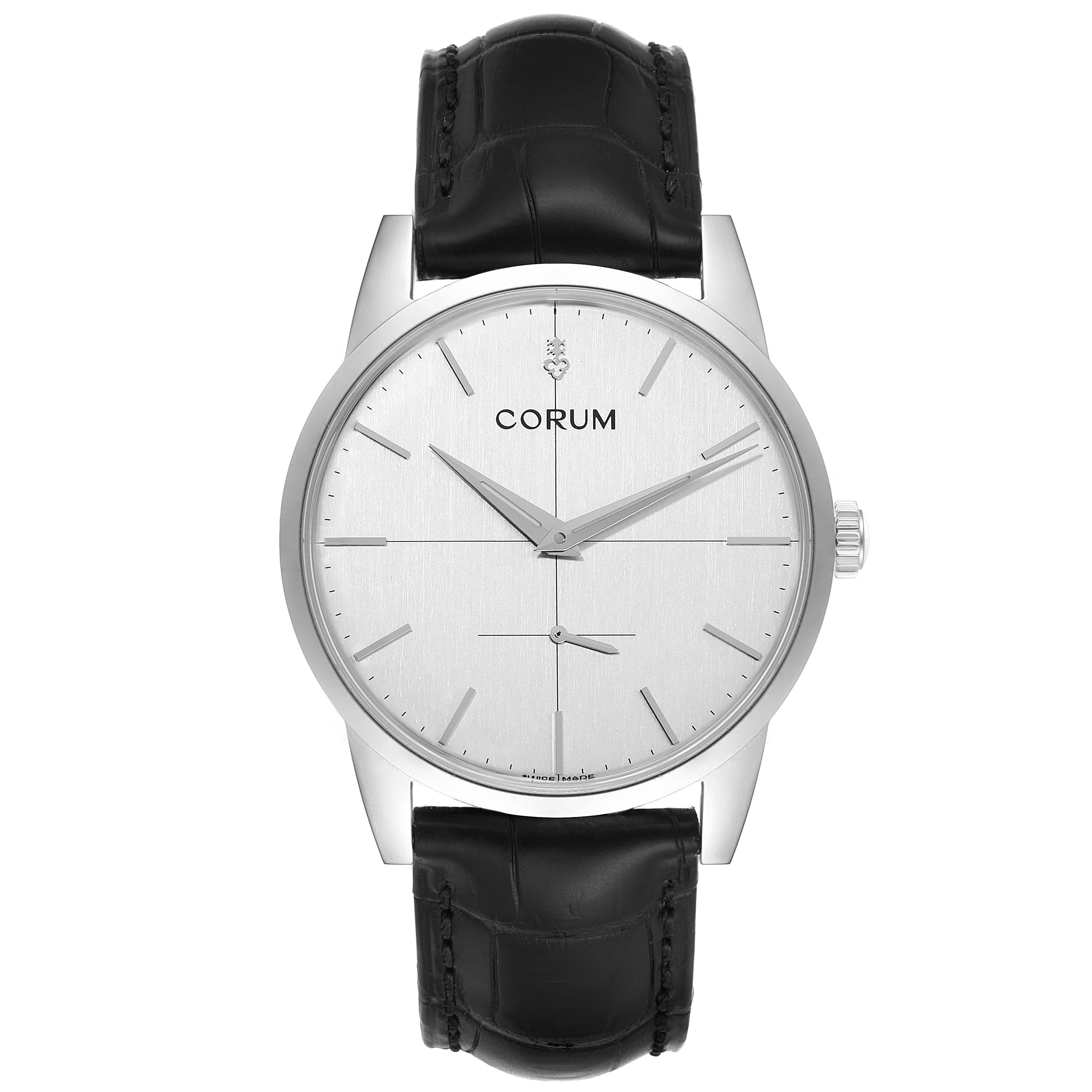 The image shows a frontal view of the Corum Heritage V157/02614 Men's Stainless Steel Silver Dial V157/02614 Men's Stainless Steel Silver Dial watch, featuring its dial, bezel, and leather strap.