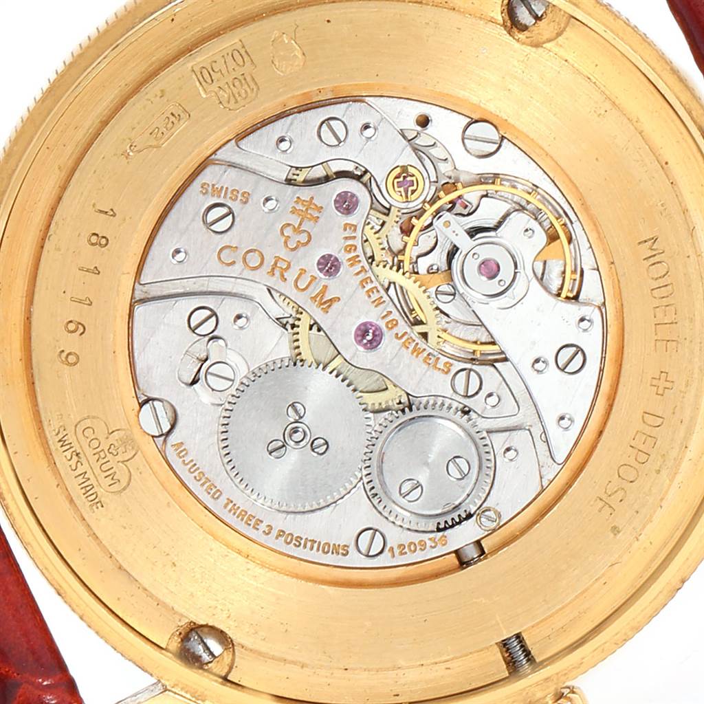 This image shows the intricate mechanical movement of a Corum Coin Watch Men's Yellow Gold Black Dial Men's Yellow Gold Black Dial model from the back angle.