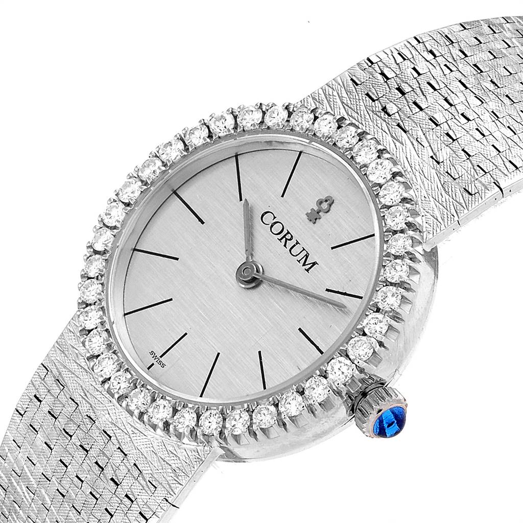 The image shows a close-up, angled view of the Corum 80358 Women's White Gold Silver Dial 80358 Women's White Gold Silver Dial 18K White Gold Diamond Vintage Cocktail Ladies Watch, highlighting the face, bezel, and part of the band.