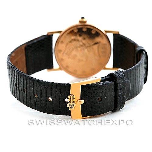 The image shows the back angle of the Corum Women's Yellow Gold Black Dial Women's Yellow Gold Black Dial Vintage Ladies 18K Yellow Gold 10 Dollars Coin Watch, including the watch case and black leather strap.