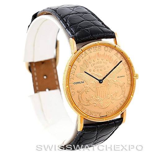 The image shows a Corum Vintage watch at an angled view featuring its gold coin dial, black leather strap, and crown.