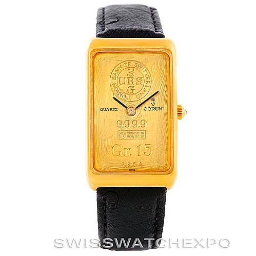 The image shows a vintage Corum watch from a front angle, highlighting its rectangular gold face and black leather strap.