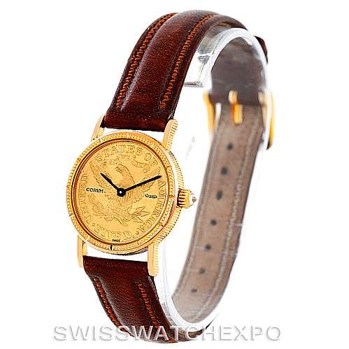 This image shows a Corum Women's Yellow Gold Black Dial Women's Yellow Gold Black Dial Vintage Ladies 18K Yellow Gold 5 Dollars Coin Watch from a front angle, highlighting the gold case and brown leather strap.