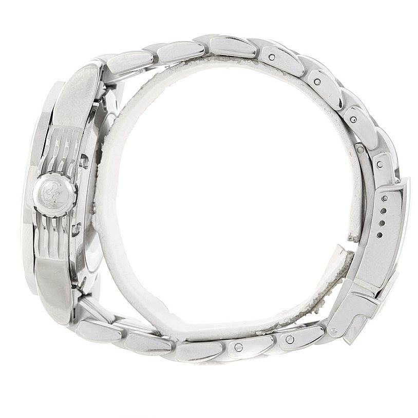 The image shows the side view of the Corum Admiral
s Cup watch, highlighting the crown and the metal bracelet.