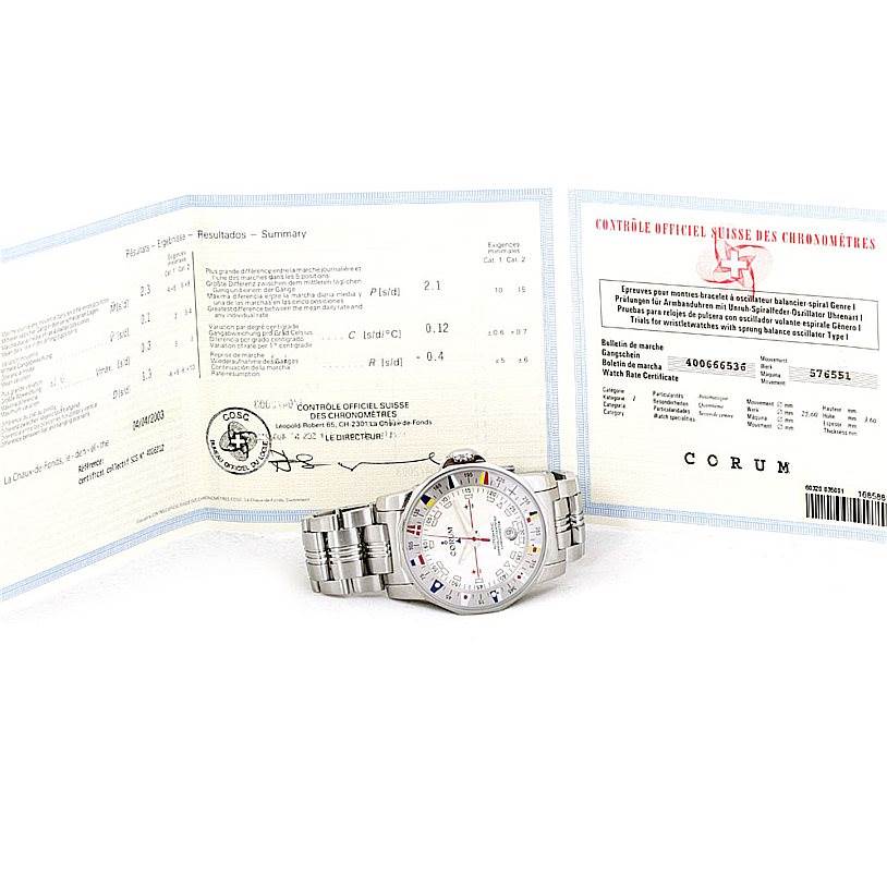The Admirals Cup watch by Corum is shown from the front, including its face, bracelet, and accompanying certification documents.