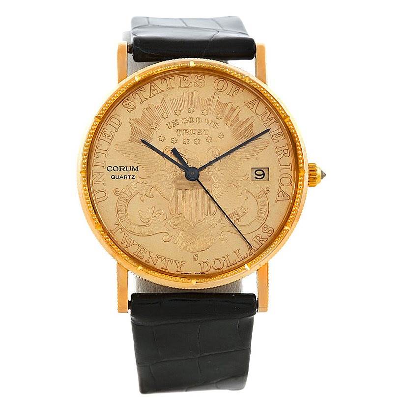 The image shows a Corum Coin Watch Men's Yellow Gold Black Dial Men's Yellow Gold Black Dial model from the front, featuring a detailed face design and a leather strap.