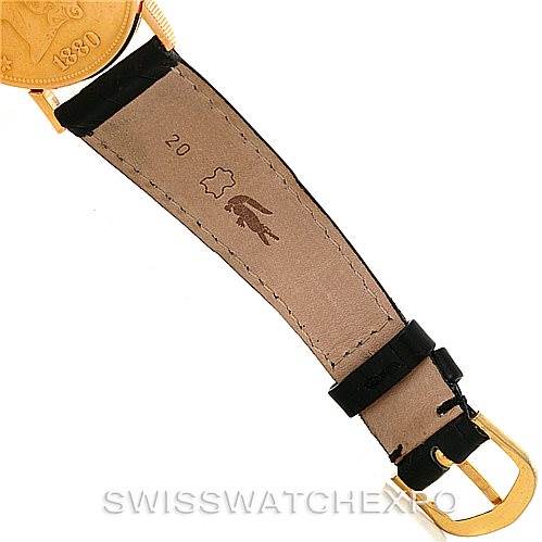 This image shows the leather strap and buckle of a Vintage Corum watch, including part of the engraved watch face.