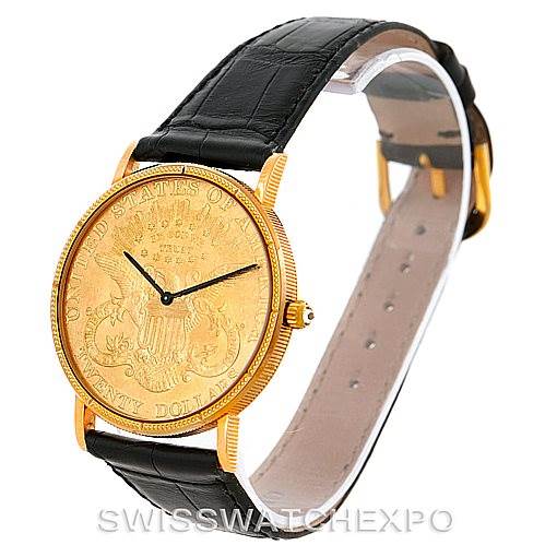 The image shows a vintage Corum watch from a front angle, highlighting its gold coin dial and black leather strap.