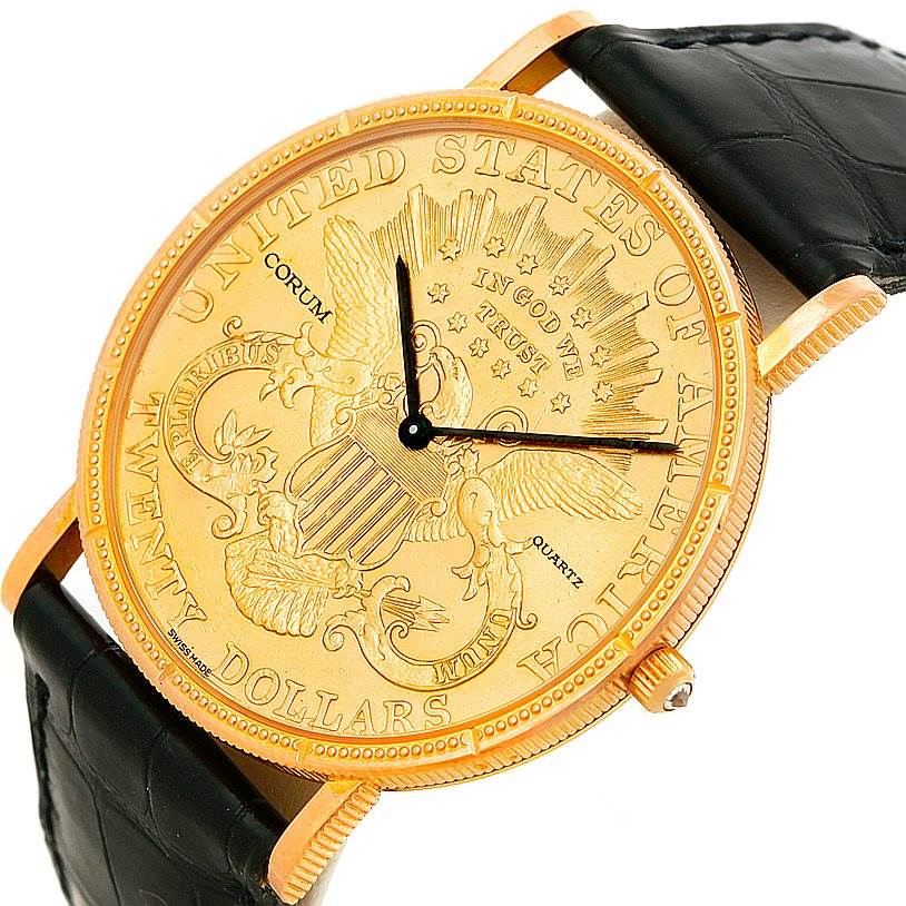 The image shows the front view of a Corum Coin Watch Men's Yellow Gold Black Dial Men's Yellow Gold Black Dial model, focusing on its gold coin-inspired dial and black strap.