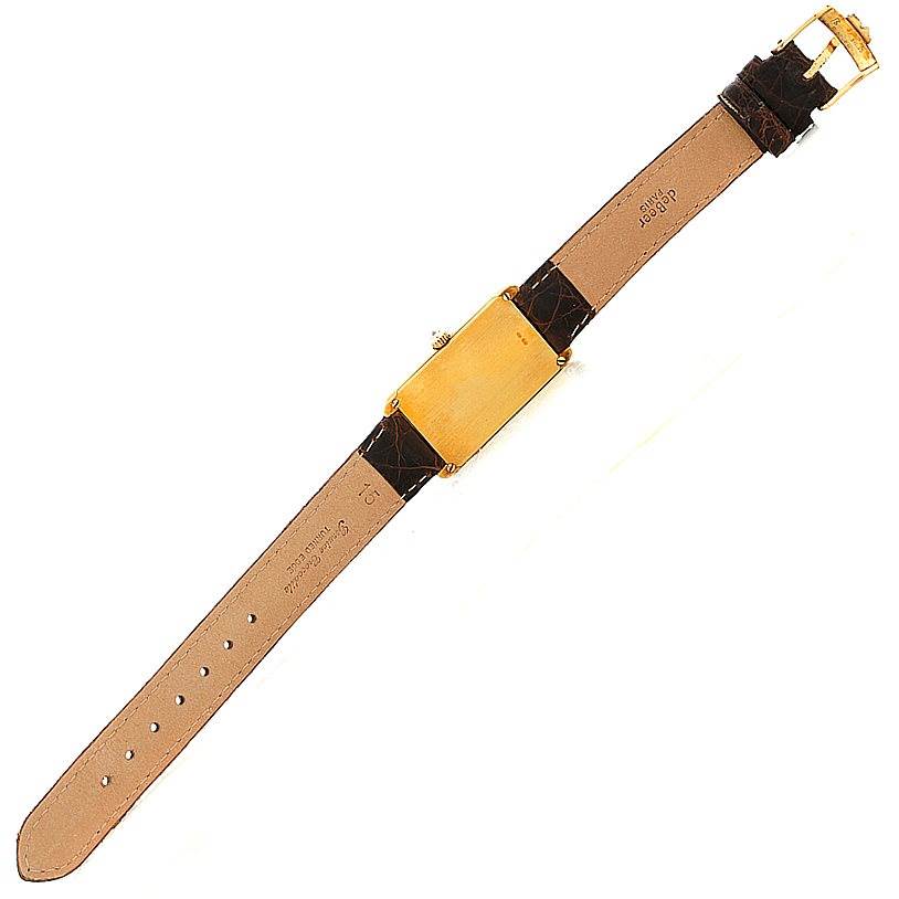 This image shows the backside of the Corum 42456 Women's Yellow Gold Champagne Dial 42456 Women's Yellow Gold Champagne Dial 18K Yellow Gold Diamond 5 Gram Ingot 999.9 Watch, including the strap and buckle.