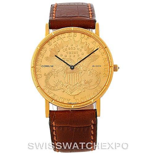 The Coin Watch model by Corum is shown from a front angle, displaying its gold face, hands, and brown leather strap.
