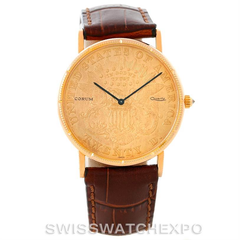 The image shows a Corum Coin Watch Men's Yellow Gold Black Dial Men's Yellow Gold Black Dial with a gold case, visible face details, leather strap, and hands pointed at 12 and 10.