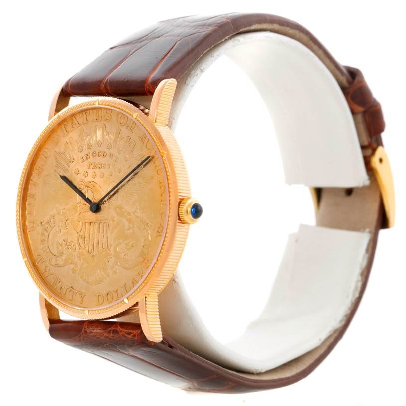 This side angle view of the Corum Coin Watch Men's Yellow Gold Black Dial Men's Yellow Gold Black Dial model shows the coin-designed dial, brown leather strap, and gold detailing.