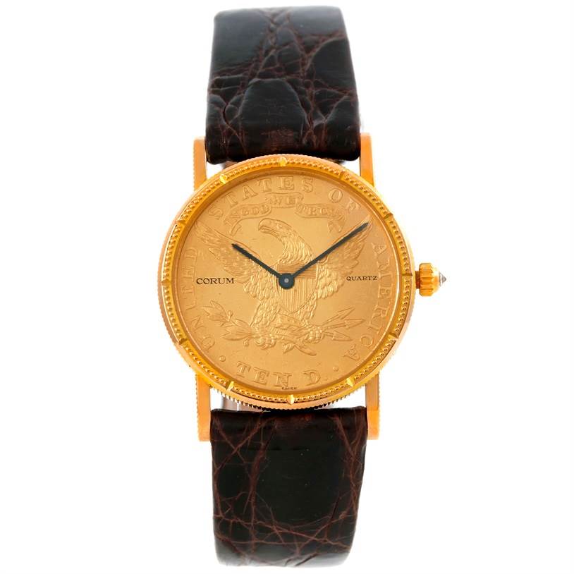The image shows a front view of the Corum Women's Yellow Gold Black Dial Women's Yellow Gold Black Dial 22K Yellow Gold 10 Dollars Coin Diamond Ladies Watch, including the face, strap, and crown.