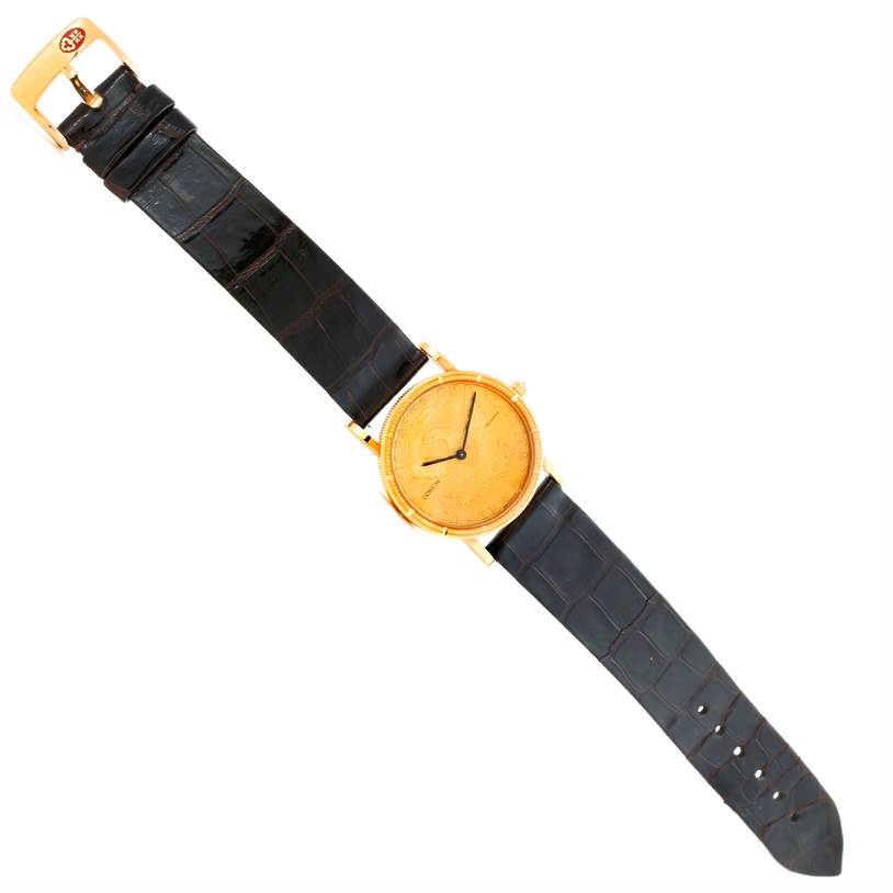 The image shows a top-down view of the Corum Women's  Women's  18K Yellow Gold 10 Dollars Coin Diamond Ladies Watch Unworn model, displaying the entire watch.