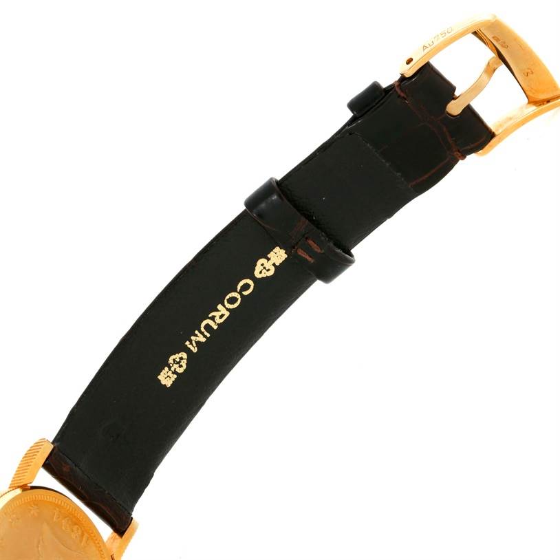 The image shows the band and clasp of the Corum Women's  Women's  18K Yellow Gold 10 Dollars Coin Diamond Ladies Watch Unworn model.