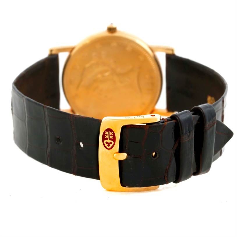 This image shows the back and strap of the Corum Women's  Women's  18K Yellow Gold 10 Dollars Coin Diamond Ladies Watch Unworn model.