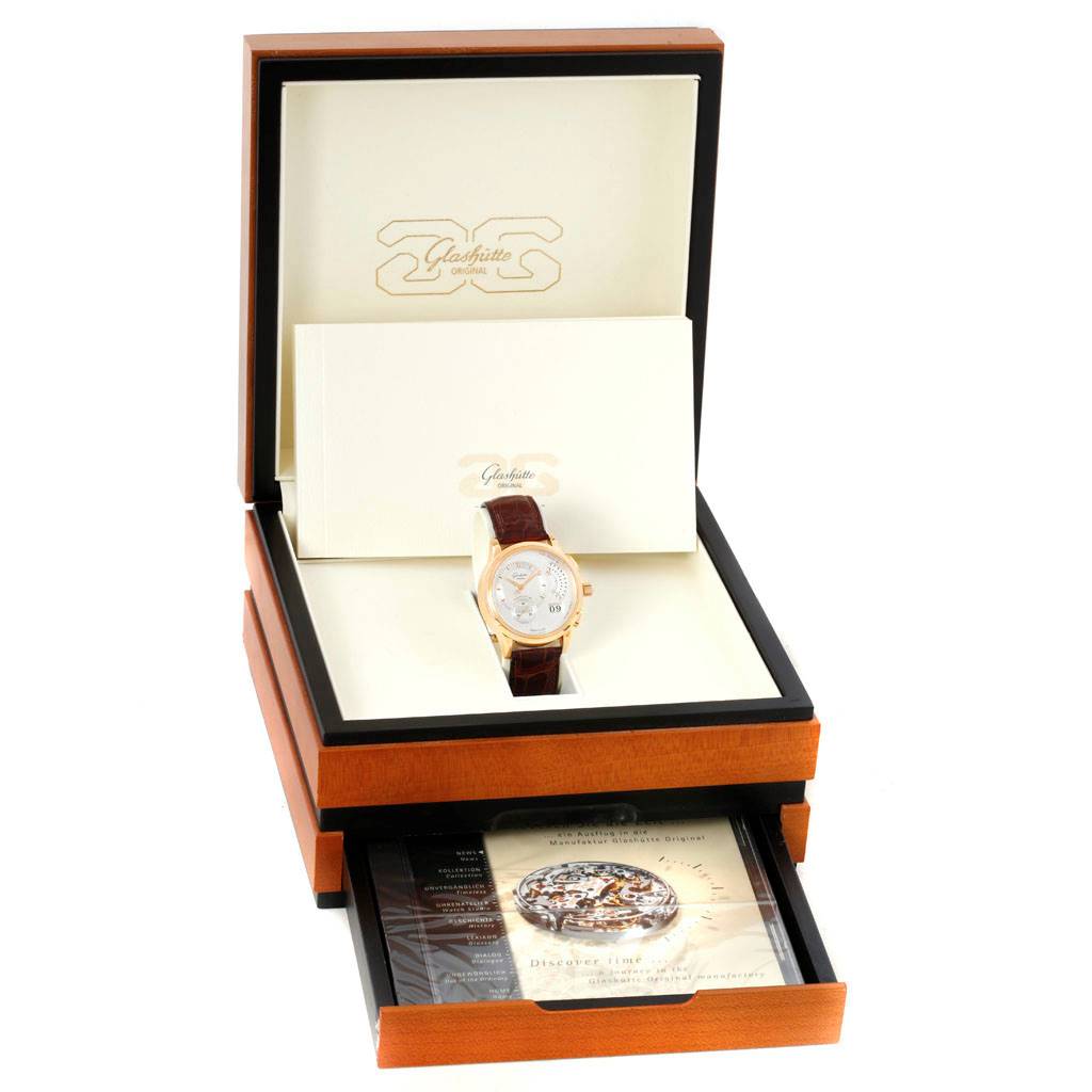 The image shows a Glashütte Pano watch displayed in its open box with visible accessories, viewed from a front angle.
