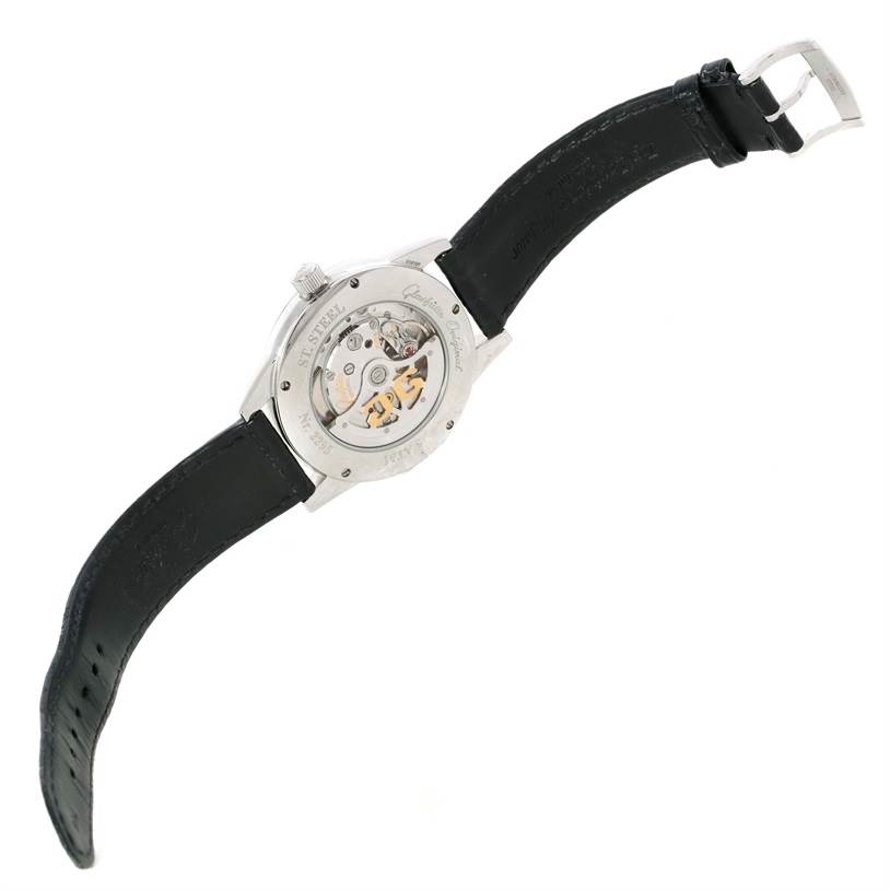 This image shows the back of the Glashütte Senator watch, highlighting its open caseback and black leather strap.