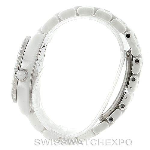 The image shows a side view of the Chanel H2422 Women's Stainless Steel White Dial H2422 Women's Stainless Steel White Dial J12 White Ceramic Diamonds Quartz Ladies Watch H2422, focusing on the bracelet and crown.