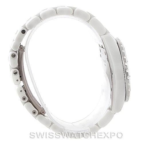 The image shows a side view of the Chanel H2422 Women's Stainless Steel White Dial H2422 Women's Stainless Steel White Dial J12 White Ceramic Diamonds Quartz Ladies Watch H2422, highlighting its bracelet and crown.