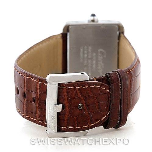This image shows the back of the Cartier Tank Divan W6300755 Men's Stainless Steel Silver Dial W6300755 Men's Stainless Steel Silver Dial watch, focusing on the brown leather strap and the clasp.