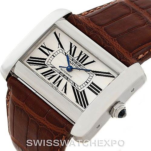 The image shows the Cartier Tank Divan W6300755 Men's Stainless Steel Silver Dial W6300755 Men's Stainless Steel Silver Dial watch at an angle, featuring its dial with Roman numerals, blue hands, silver case, and brown leather strap.