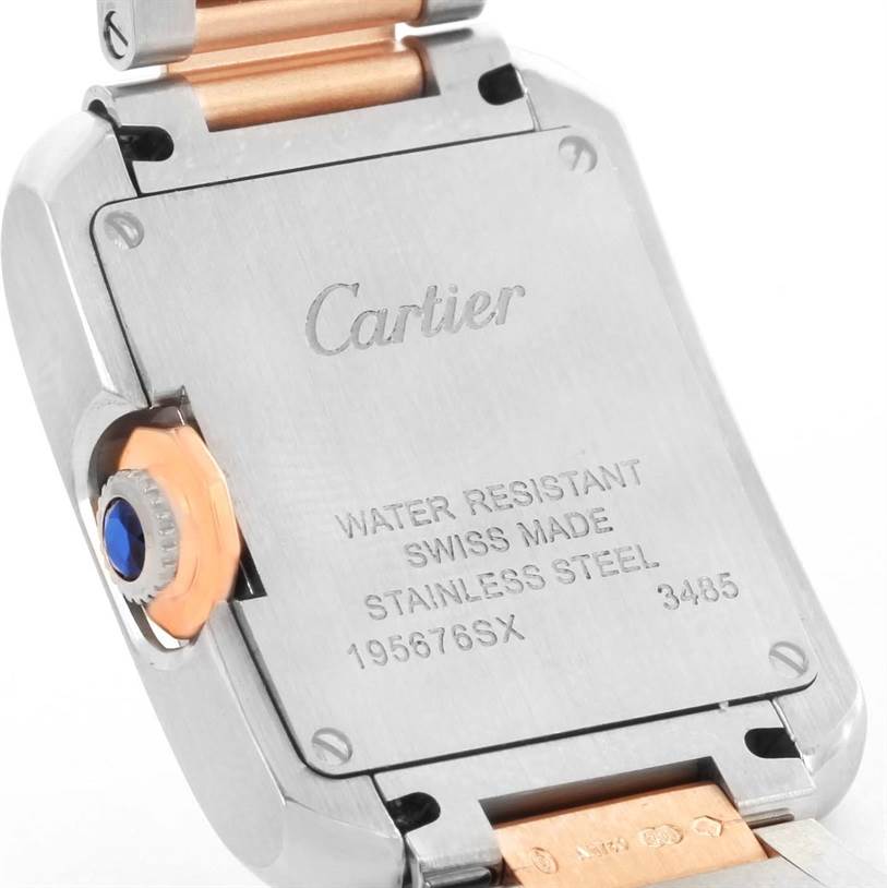 The image shows the back case of a Cartier Tank Anglaise WT100024 Women's Steel and Gold (two tone) Silver Dial WT100024 Women's Steel and Gold (two tone) Silver Dial watch, highlighting the brand engraving and specifications.