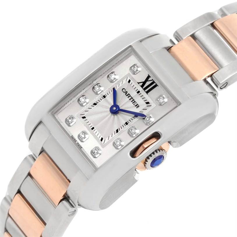 This image shows a close-up of the Cartier Tank Anglaise WT100024 Women's Steel and Gold (two tone) Silver Dial WT100024 Women's Steel and Gold (two tone) Silver Dial watch face and part of its two-tone metal bracelet at an angle.