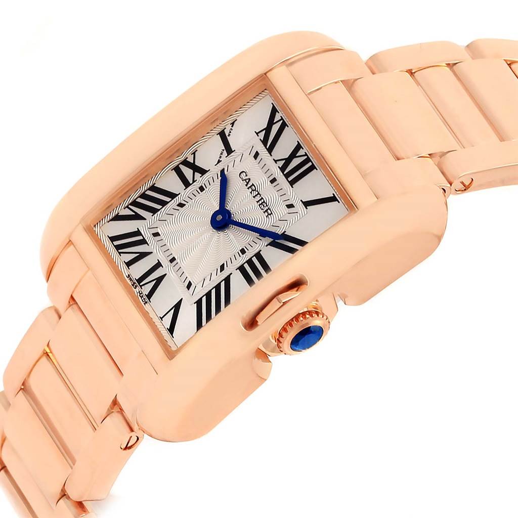 The image shows a close-up side angle of the Cartier Tank Anglaise W5310013 Women's Rose Gold Silver Dial W5310013 Women's Rose Gold Silver Dial watch, highlighting the gold case, dial, crown, and part of the bracelet.