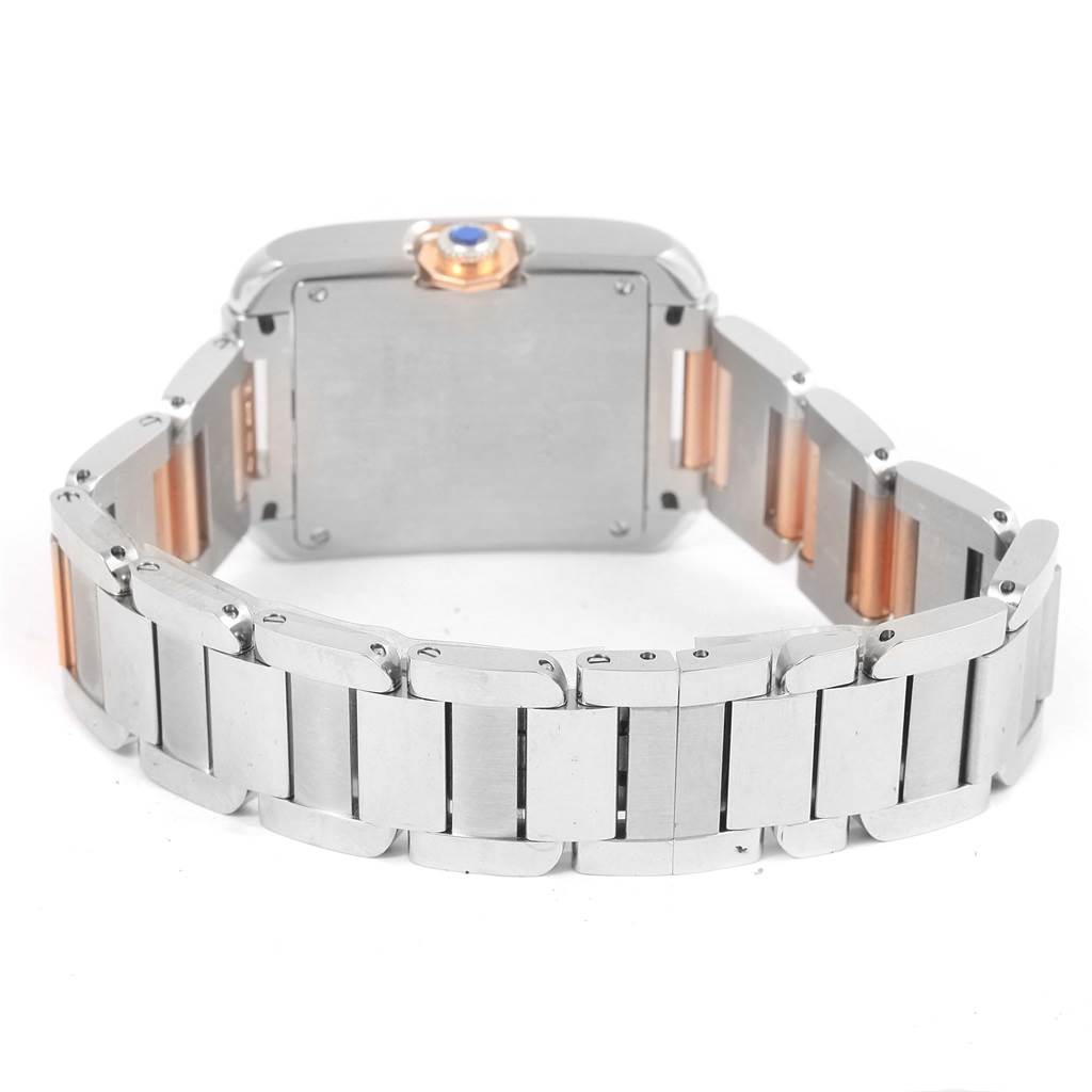 The image shows the back view of a Cartier Tank Anglaise WT100032 Women's Steel and Gold (two tone) Silver Dial WT100032 Women's Steel and Gold (two tone) Silver Dial watch, highlighting its metal bracelet and caseback.