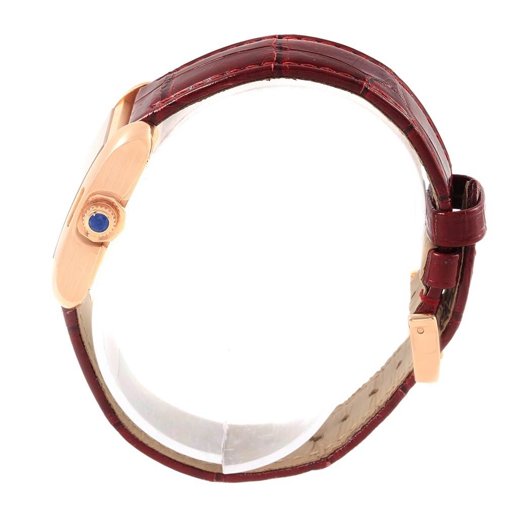 The image shows a side view of the Cartier Tank Anglaise WJTA0007 Women's Rose Gold Silver Dial WJTA0007 Women's Rose Gold Silver Dial watch, highlighting the crown and brown leather strap.