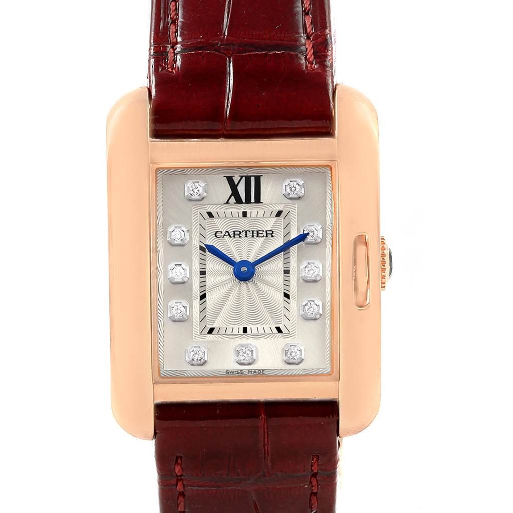The image shows a Cartier Tank Anglaise WJTA0007 Women's Rose Gold Silver Dial WJTA0007 Women's Rose Gold Silver Dial watch front view, highlighting its rectangular dial, Roman numeral, and leather strap.
