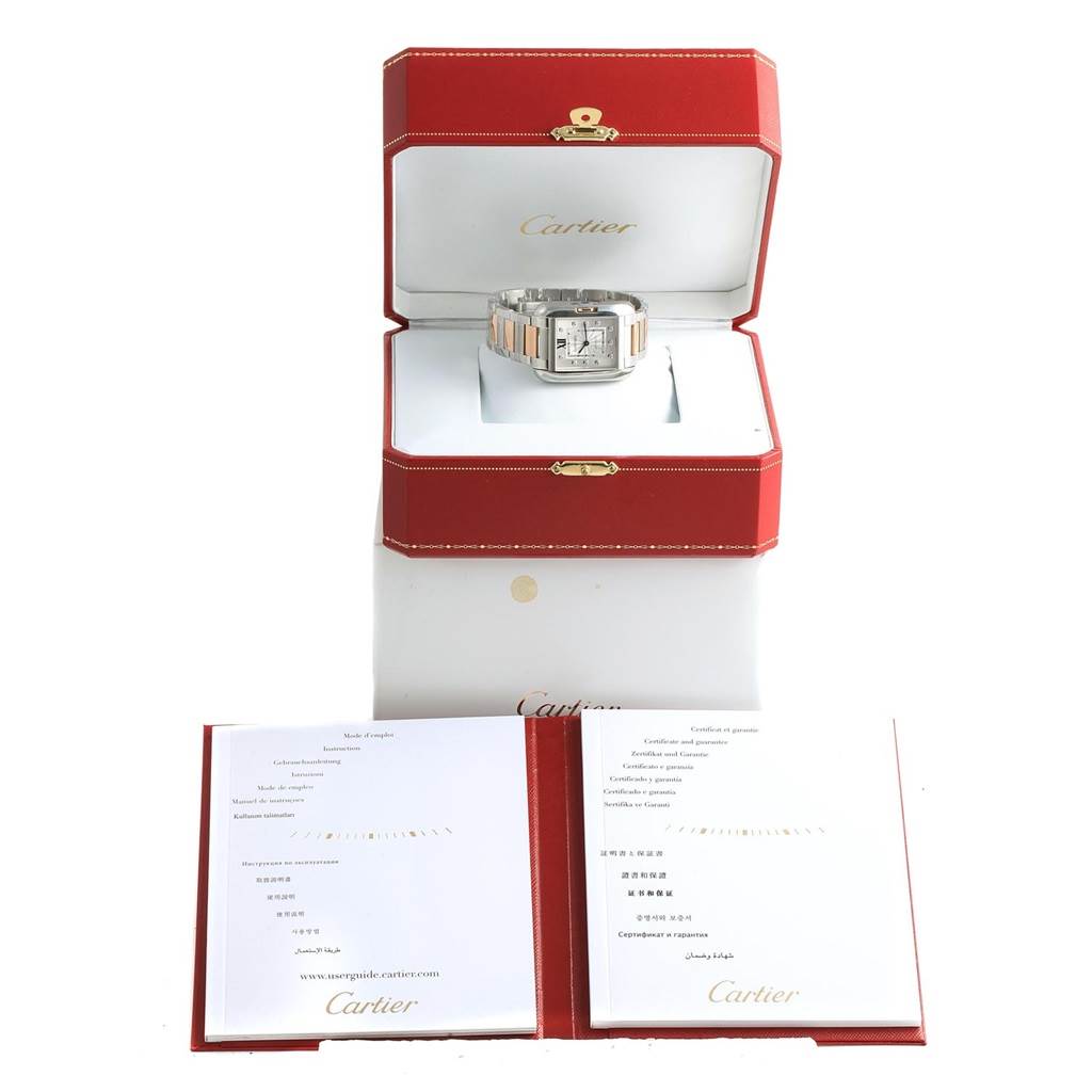 The Cartier Tank Anglaise WT100034 Steel and Gold (two tone) Silver Dial WT100034 Steel and Gold (two tone) Silver Dial watch is displayed in an open red box with accompanying manuals in front.