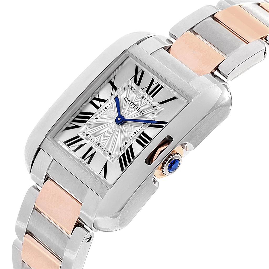 This image shows a close-up angled view of a Cartier Tank Anglaise WT100032 Women's Steel and Gold (two tone) Silver Dial WT100032 Women's Steel and Gold (two tone) Silver Dial watch face and part of the strap.