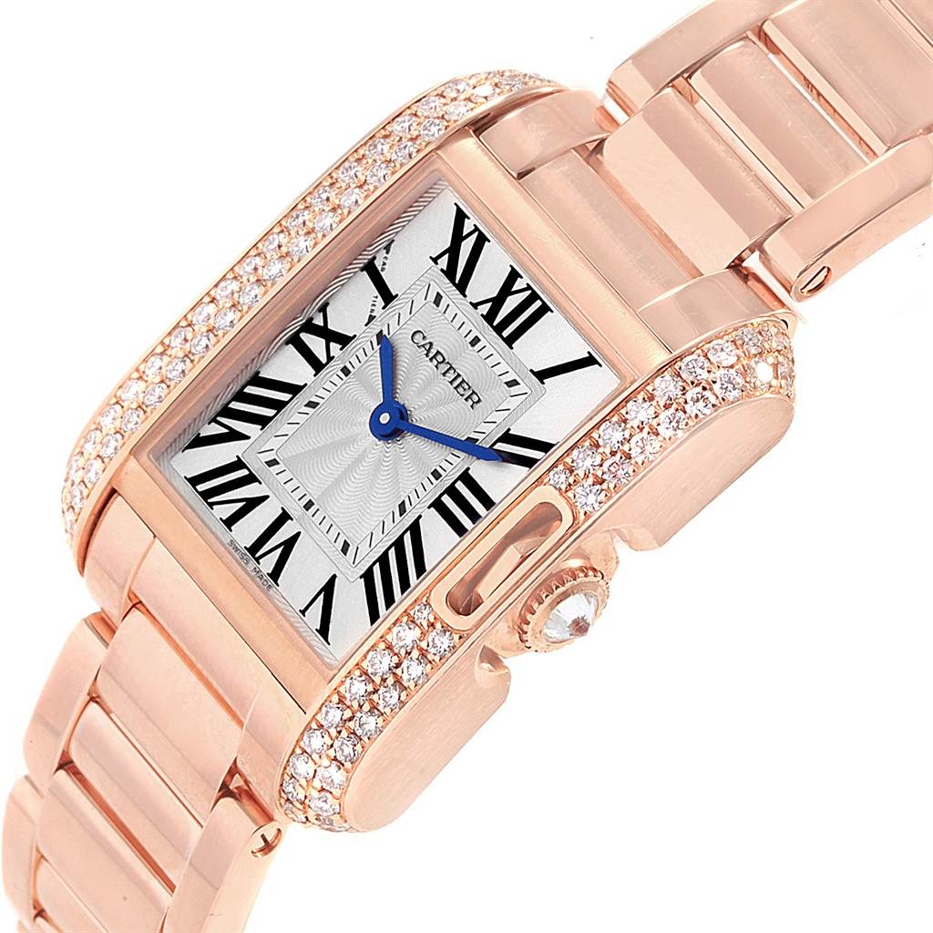 The Cartier Tank Anglaise WT100002 Women's Rose Gold Silver Dial WT100002 Women's Rose Gold Silver Dial watch is angled to display the face, crown, and part of the bracelet, highlighting its design and details.