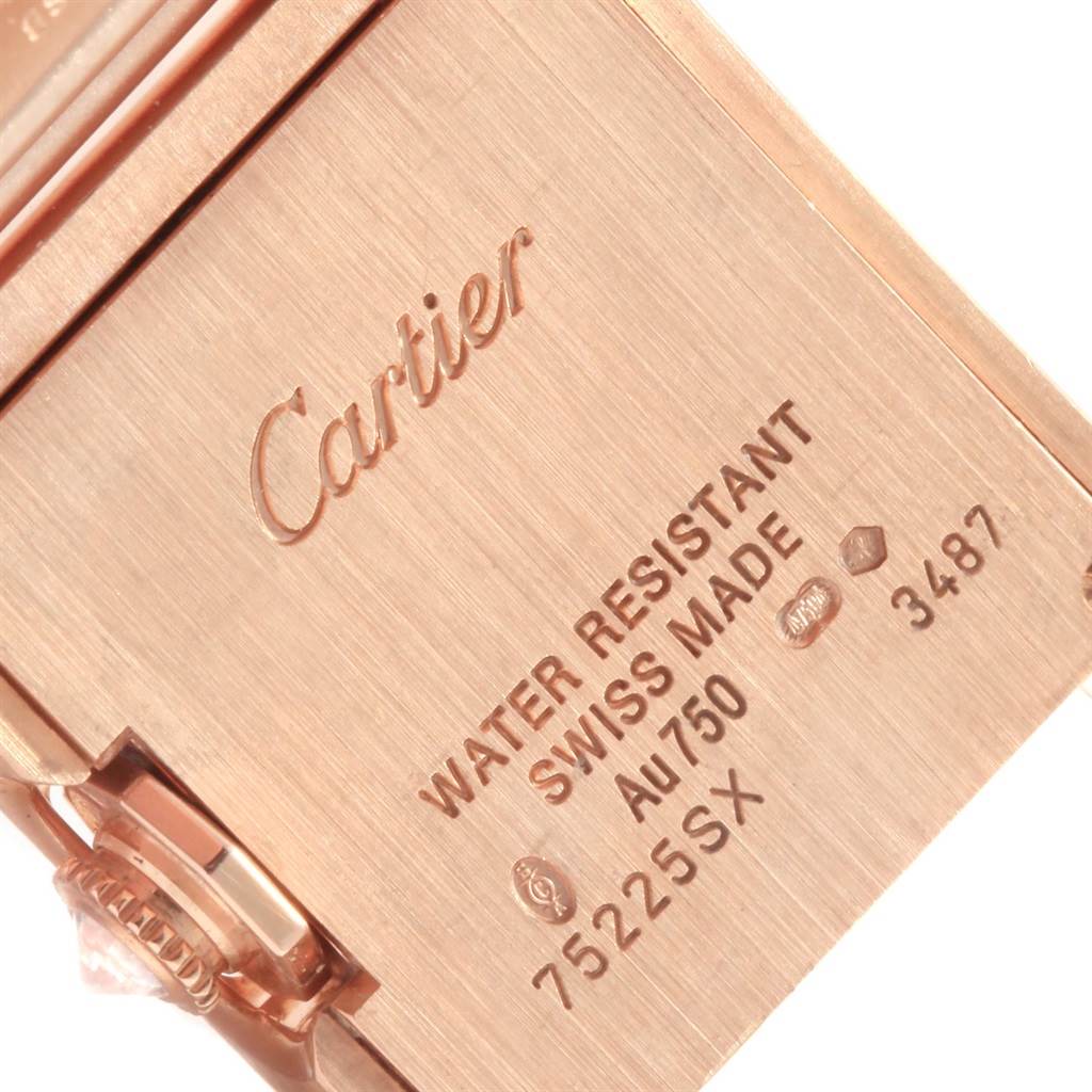 The image shows the back case of a Cartier Tank Anglaise WT100002 Women's Rose Gold Silver Dial WT100002 Women's Rose Gold Silver Dial watch, highlighting the engravings and water-resistant markings.