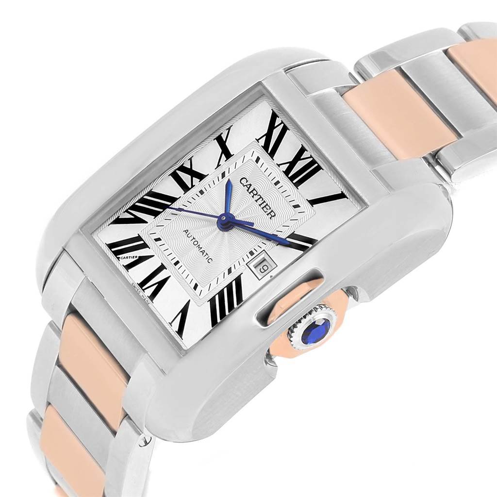 This image shows a close-up angled view of the Cartier Tank Anglaise W5310007 Men
s Steel and Gold (two tone) Silver Dial W5310007 Men
s Steel and Gold (two tone) Silver Dial watch, highlighting the dial, crown, and two-tone bracelet.