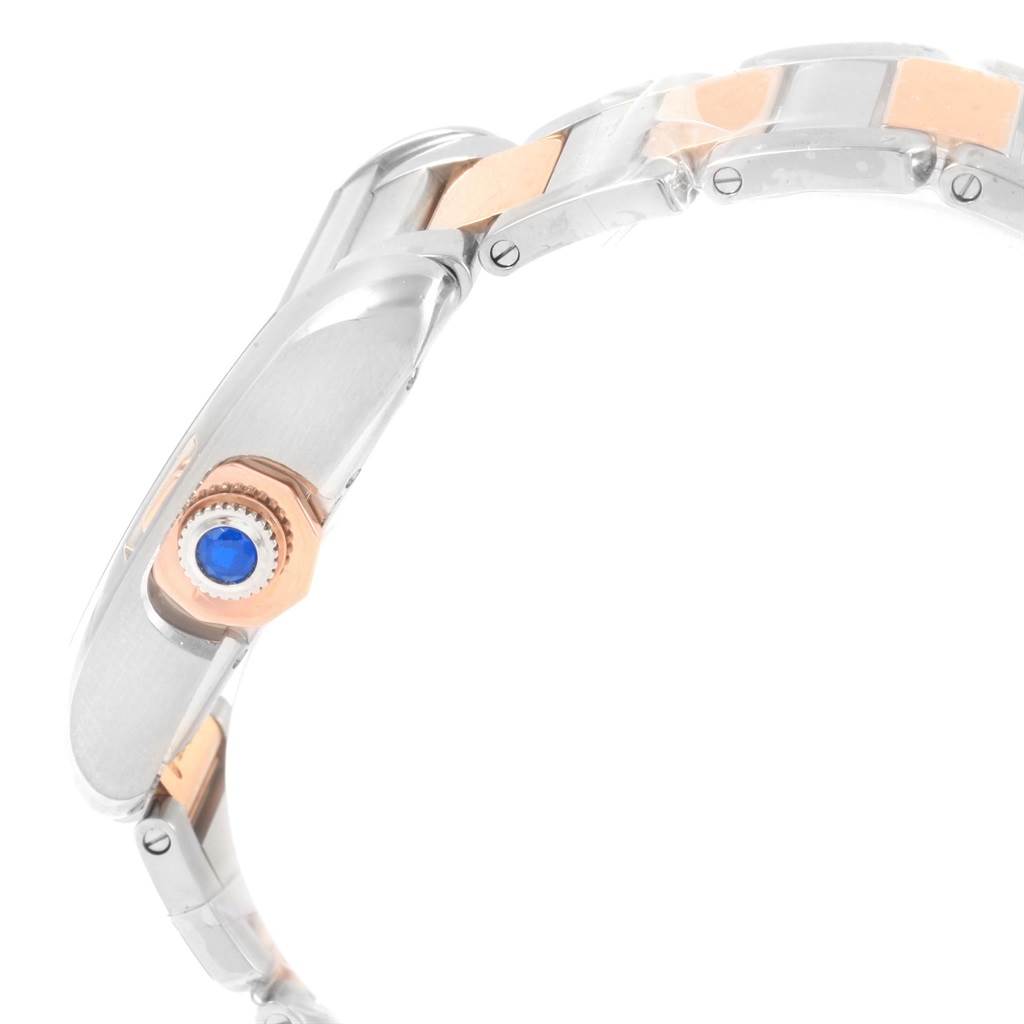 The Tank Anglaise by Cartier is shown at a side angle, focusing on its crown and part of the bracelet.