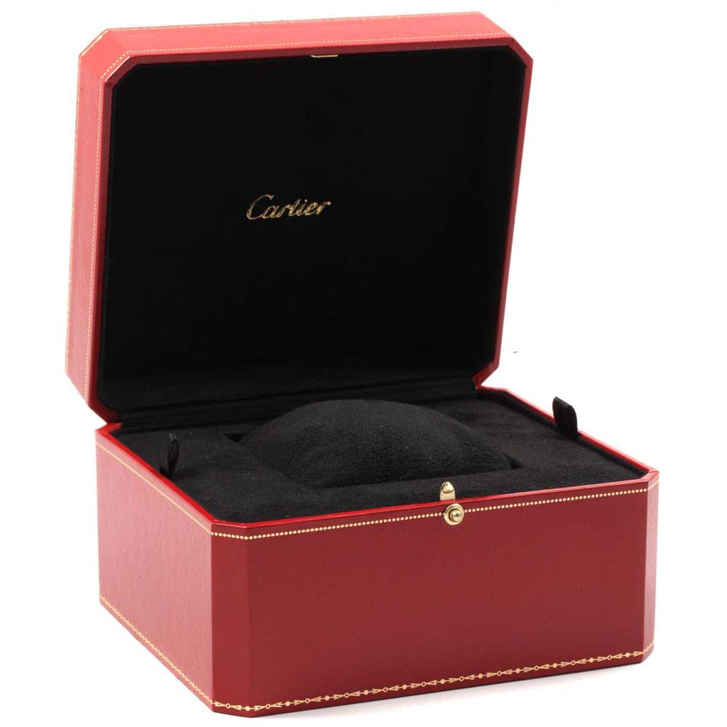 This image shows an open red Cartier box likely for the Tank Anglaise model watch, with the brand's logo inside the lid.