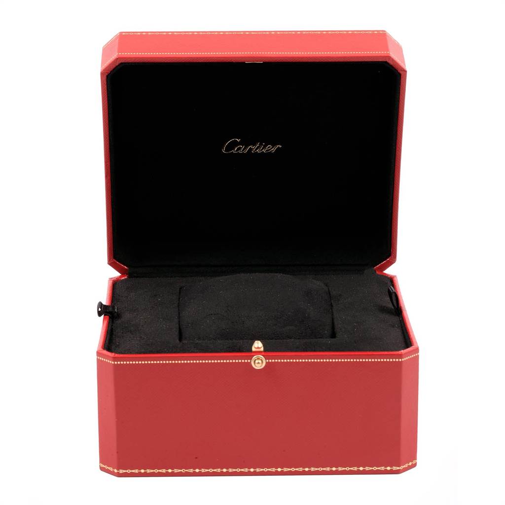 This image shows an open Cartier watch box, presumably for the Tank Anglaise model, with a red exterior and black interior.