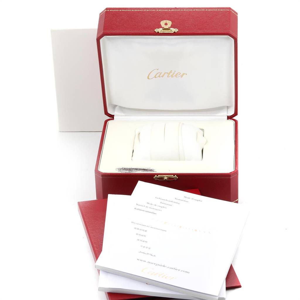 The image shows the packaging, manual, and empty watch case for a Cartier Tank Anglaise W5310007 Women's Steel and Gold (two tone) Silver Dial W5310007 Women's Steel and Gold (two tone) Silver Dial model from a front angle.