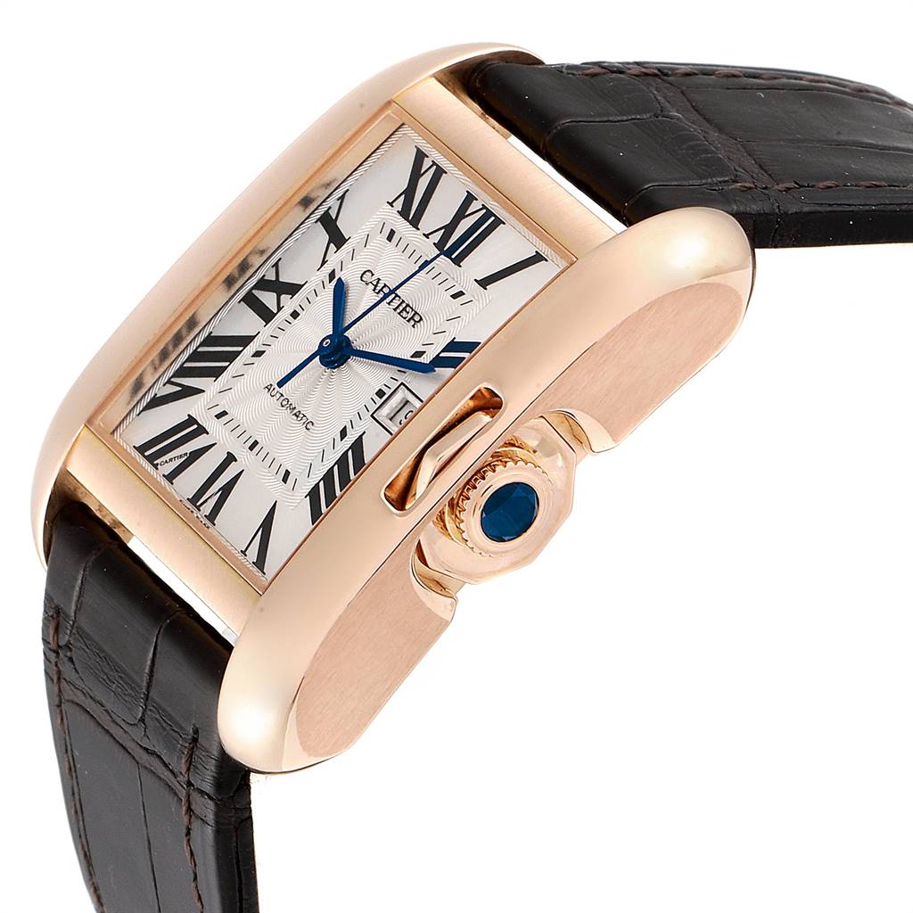 The image shows a Tank Anglaise model by Cartier at an oblique angle, highlighting the watch face, crown, and part of the leather strap.